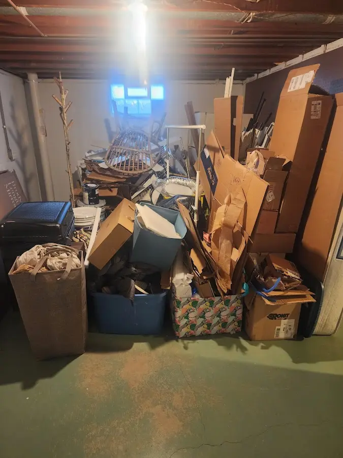 Roll-off dumpster container at job site for 6 Yard Dumpster Rental in Woodmere